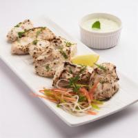 Malai Tikka Platter · Boneless chicken marinated in a spicy, cream cheese marinade mixed with a little bit of whit...