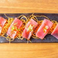 Tuna Tataki · Peppercorn seared tuna with chef's special sauce.