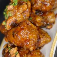 Chicken Wings (8 Pieces) · Gluten free. Korean BBQ with honey roasted peanuts, buffalo, or hot buffalo with bleu wing s...