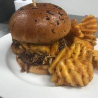 Rancher Burger · Eight ounce burger patty topped with braised pulled pork, bourbon bbq sauce, smoked. cheddar...
