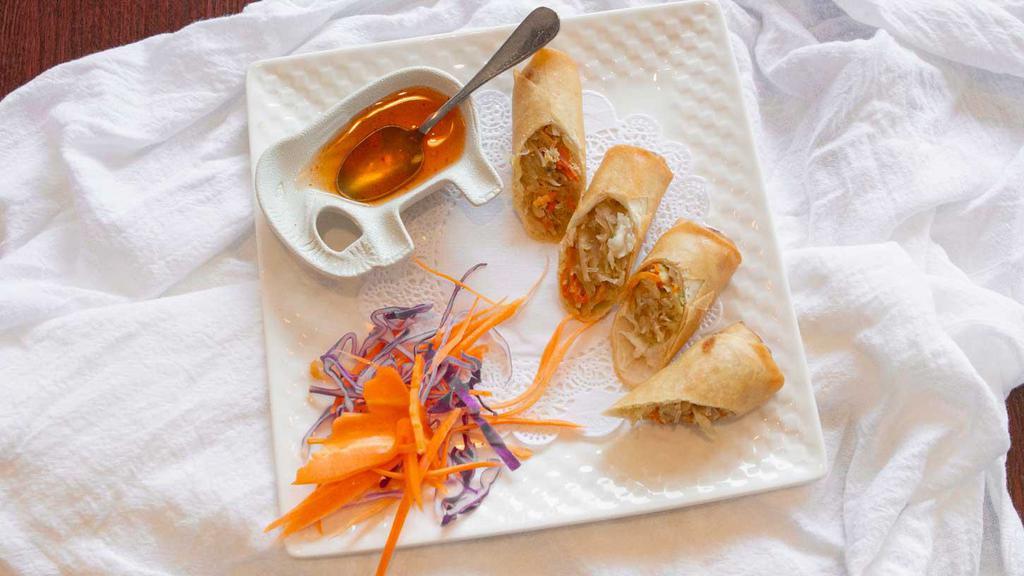 Chicken Egg Rolls (2 Pcs) · Deep-fried homemade egg rolls with chicken served with sweet and sour sauce.
