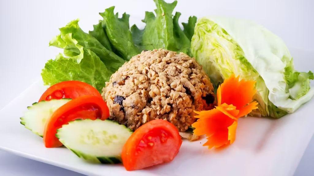 Chicken Lettuce Wraps · Quickly cooked ground chicken, shiitake mushroom and water chestnut served with cool lettuce cup.