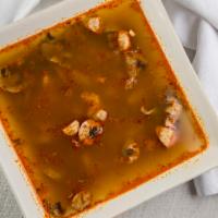 Tom Yum (Cup) · Light sweet and sour soup with a touch of spicy chili paste put together with mushrooms, lem...