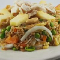 Kow Pad Pong Garee · Fried rice with yellow curry powder, egg, onions, pea-carrots and pineapple.