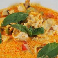 Pad Ped · Red curry paste and coconut milk cooked together with slice eggplants, white onions, bamboo ...