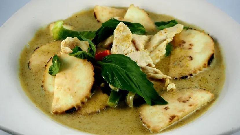 Gaeng Kheaw Waan (Green Curry) · Slice eggplant, fresh cut bell pepper cooked with green curry and coconut milk then topped with fresh basil leaves. Yellow curry paste and coconut milk cooked together with potatoes cottage fried and onions, served with a side dish of cucumber salad.