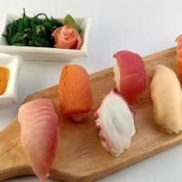 Sushi Regular · One California roll and four pieces of nigiri.