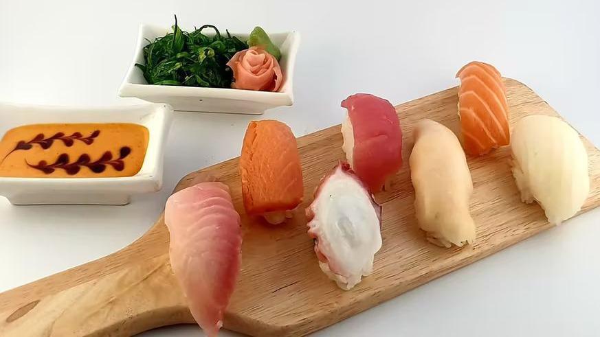 Sushi Regular · One California roll and four pieces of nigiri.