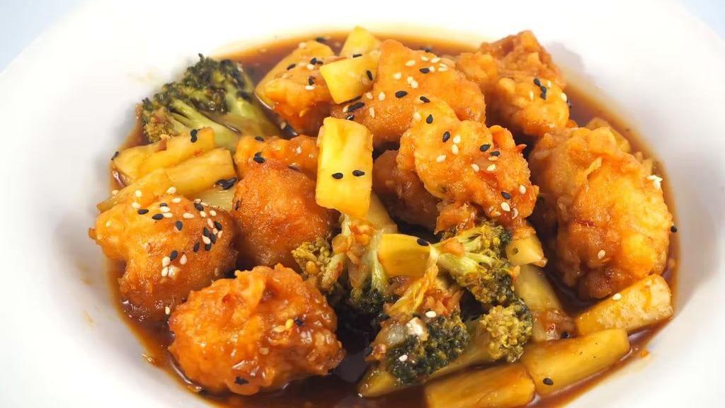Honey Chicken · Lightly breaded chicken with pineapple and carrot in sweet and sour honey sauce.