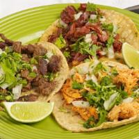 Taco · Soft corn tortilla with choice of meat, topped with option of onion and cilantro or lecture ...