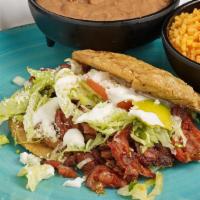 Gorditas · Handmade stuffed thick tortilla choice of meat and toppings.