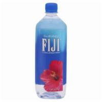 Fiji Water (1 L) · The 1.0L bottle is perfect for staying hydrated while traveling, hiking, or golfing.