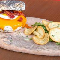 Egg, Bacon And Chesse Bagel · Boiled and baked round bread roll.