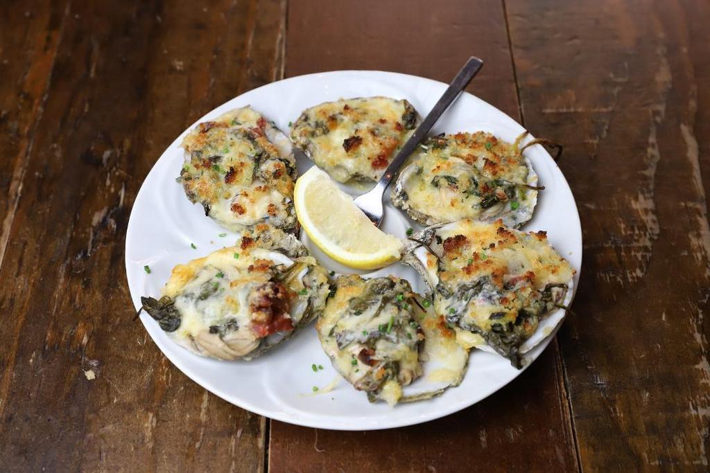Oysters Rockefeller · half dozen baked, applewood smoked bacon, sautéed spinach, havarti cheese, buttered breadcrumbs