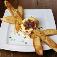 Byo Salmon Crostini · house smoked, dill caper cream, pickled red onion, tomato relish, boiled egg, baguette, char...