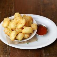 Anchor Steam Battered Cheese Curds · wisconsin white cheddar, smoked tomato basil sauce