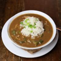 Chicken & Andouille Sausage Gumbo Cup · steamed white rice, scallion