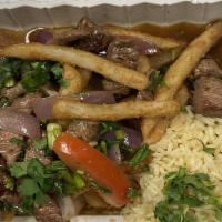 Lomo Saltado - Stir-Fry (Flambéed) · Gluten-free. No peanuts or nuts.
Stir-fried Sirloin or Chicken or Vegetables,  with onions, ...
