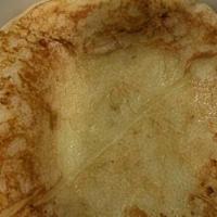 Arepa De Queso · Corn pancake with cheese.