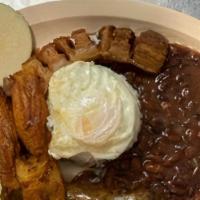 Bandeja Paisa · Antioquia custom dish. Served with rice, beans, sausage, pork rinds, egg, plantain, avocado,...