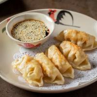 Pot Stickers (5 Pcs.) · Wheat flour pastries filled with luscious blend of shrimp and garden vegetables. Served with...