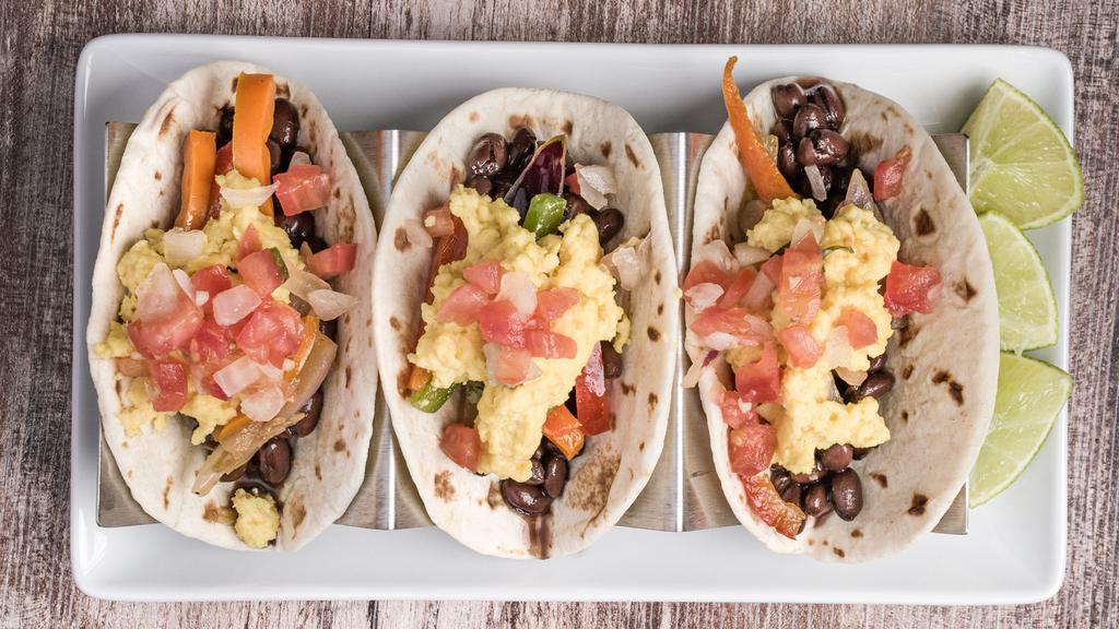 Black Bean Breakfast Tacos  · Seasoned with our southwestern spice blend our black beans are full of flavor and fulfilling. Topped with just egg, fajitas and  house made Pico de gallo, and salsa. Served on a flour tortilla.