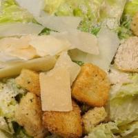 Side Caesar · Romaine Hearts // Caesar Dressing // Parmesan Cheese // Croutons