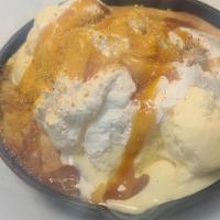 Caramel Sugar Cookie · Homemade sugar cookie baked to a warm delight, then topped with vanilla ice cream, whipped c...
