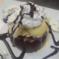 Chocolate Lava Cake · GLUTEN FREE // A warm, rich chocolate cake filled with molten chocolate, served with vanilla...