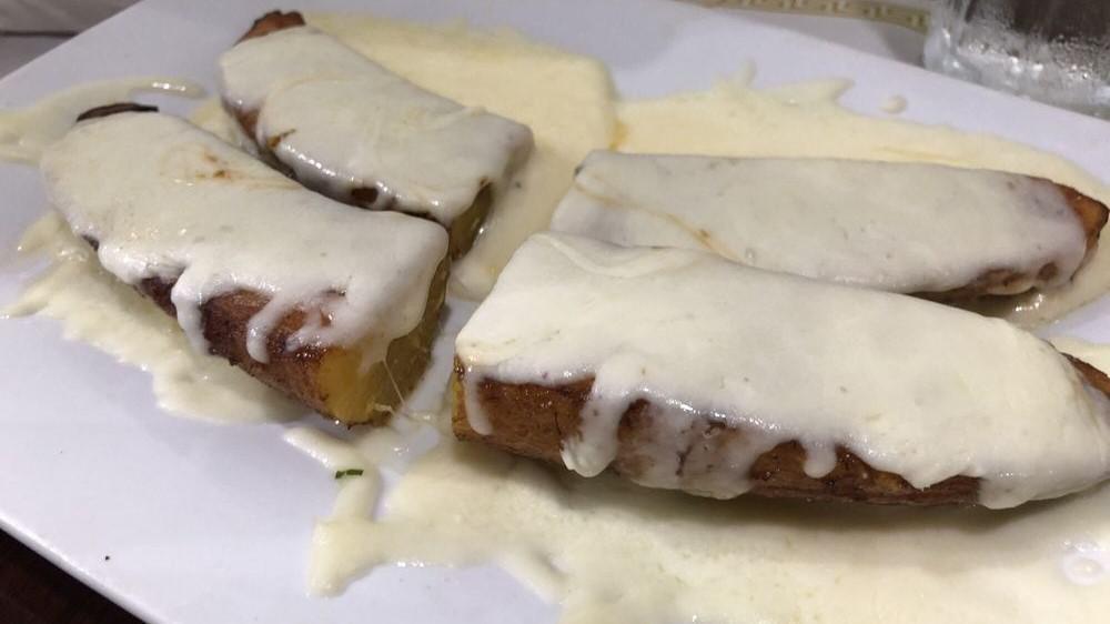 Maduro Con Queso · Fried sweet plantains with melted mozzarella cheese.