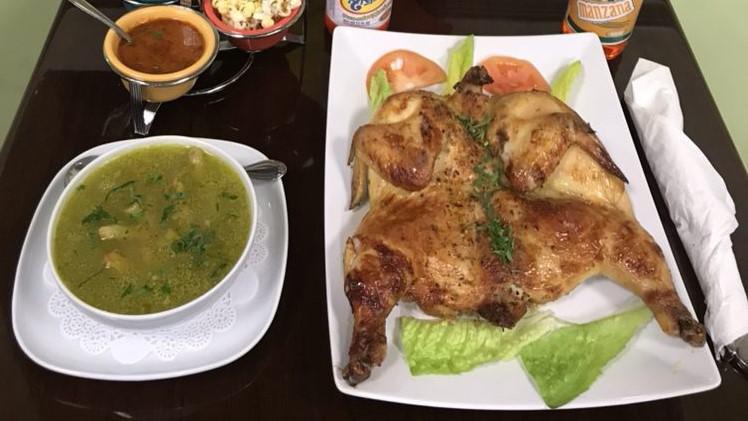 1/4 De Pollo Rostisado · Roasted chicken served with rice beans, salad, French and consome.
