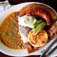Bandeha Paisa Montanera · Grill top round steak served with rice, beans, one fried eggs, Colombian sausage, corn cake,...