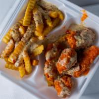 Traditional Wings (15 Pieces) · *includes side of fries