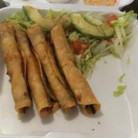 Flautas (4) · Shredded chicken or beef with cabbage, sour cream, cotija cheese and avocado.