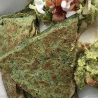 Quesadilla · Grilled chicken or steak, Chihuahua cheese, beans homemade chipotle dressing, folded in a to...