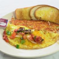 Very Veggie Omelette · tomato onion mushrooms peppers cheddar cheese hash browns toast and jelly