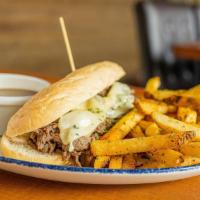 Smoked French Dip · House smoked ribeye, aioli, swiss cheese, and melted cheese in a long hoagie roll.