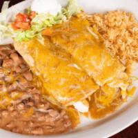 Enchiladas Dinner · Served with rice, beans garnished with lettuce, tomatoes and sour cream.