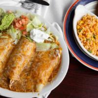 Enchiladas Supreme · Supreme combination of one chicken one ground beef, one cheese and one crab enchilada, serve...