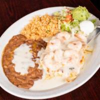 Margarita Chicken · Grilled chicken breast, covered with seven grilled shrimp and smothered in white cheese sauc...