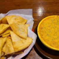 Dips & Chips · Homemade dips served with corn or fresh fried flour tortilla chips.