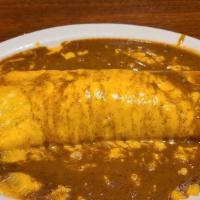 Enchilada (Beef) · Topped with cheese and enchilada sauce.