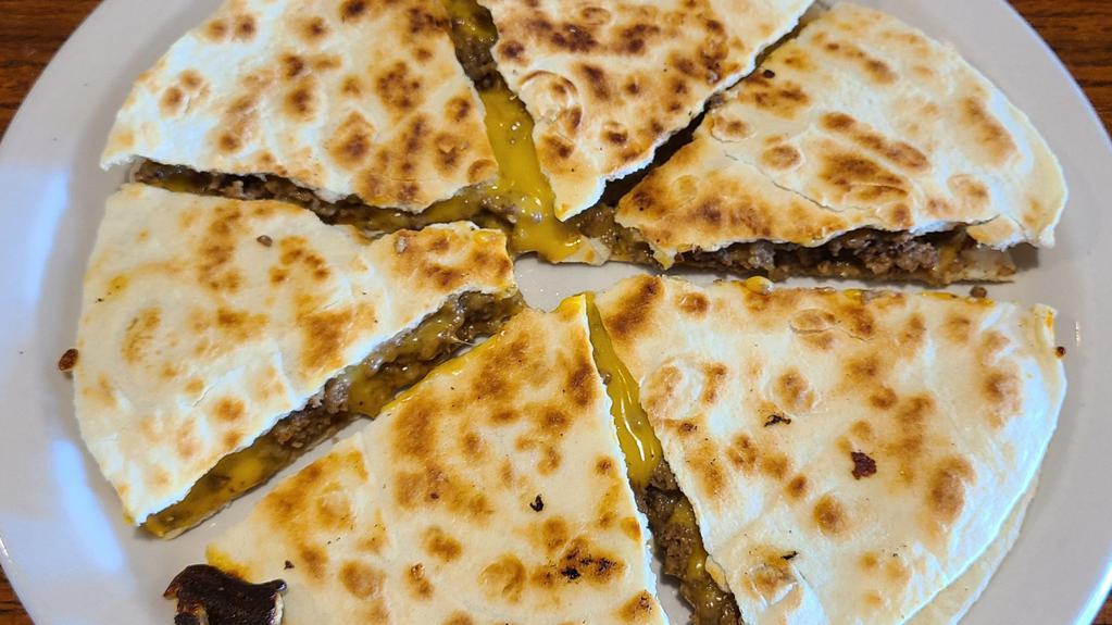 Quesadilla · Served with onion and jalapeños on the side.