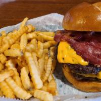 Double Bacon Cheeseburger · Two burger patties served on a toasted bun, topped with bacon and cheese.