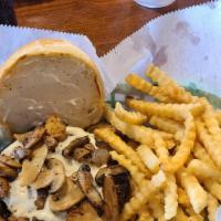 Swiss Mushroom Burger · Burger patty served on a toasted bun, topped with Swiss cheese and mushrooms.