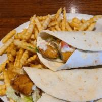 Chicken Wraps · Two wraps filled with chicken strips. Lettuce, tomatoes, and ranch