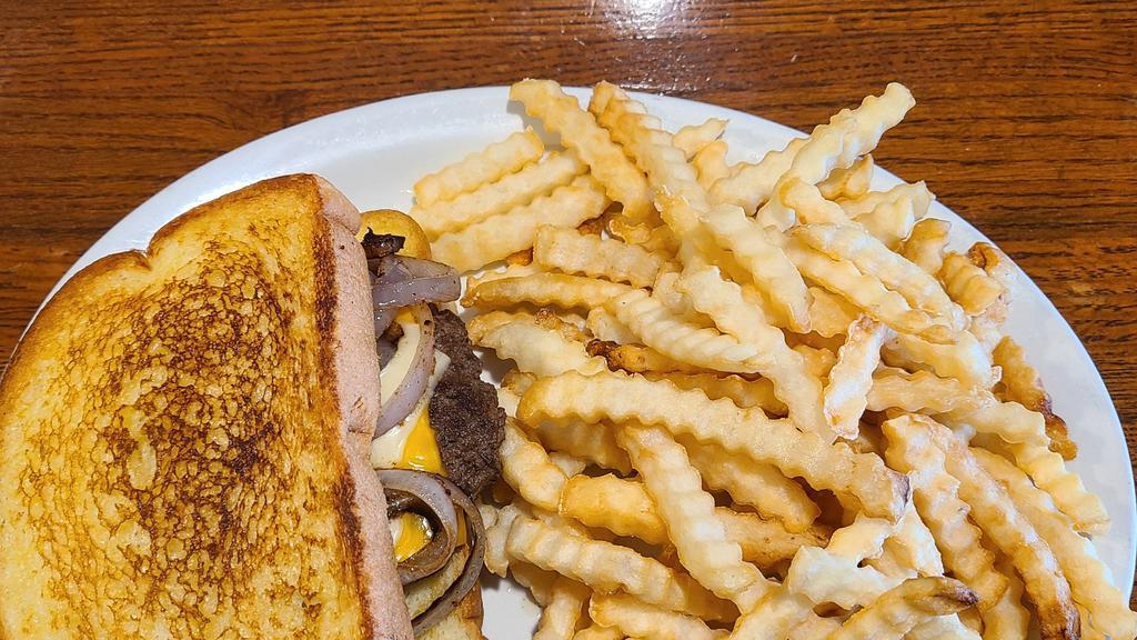 Patty Melt · Burger patty served on texas toast, with both white and yellow american cheese, and grilled red onions.