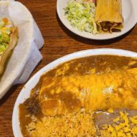 Combo · One beef taco, one beef enchilada, and one pork tamale, served with your choice of beans or ...