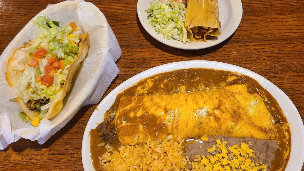 Combo · One beef taco, one beef enchilada, and one pork tamale, served with your choice of beans or rice.