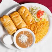 Chimichanga Dinner (3 Pcs) · Deep fried burrito stuffed with meat: chicken, ground beef, pork or shredded beef. Served wi...
